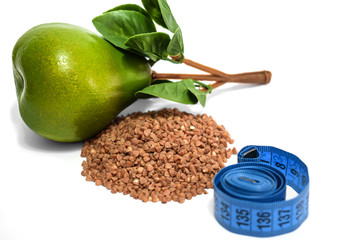 Healthy food and measuring tape on a white background