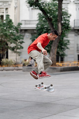 Man Skateboarding In The City