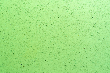 Light green marble texture with splashes and marble chips. fantasy background