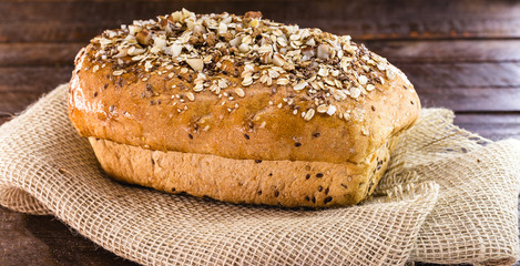 homemade bread, with chestnuts, walnuts, oats, flaxseed and seeds. Small business product for export.Vegan bread, concept of exporting organic products.