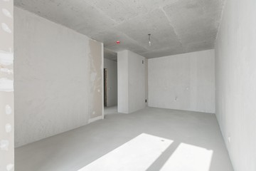 interior of the apartment without decoration in gray colors