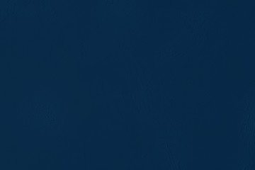 Elegant navy blue colored dark Concrete textured cool grunge abstract background with roughness and irregularities. 2020 color trend concept.