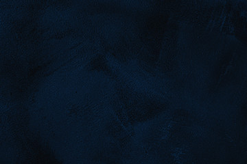 Elegant navy blue colored dark Concrete textured cool grunge abstract background with roughness and irregularities. 2020 color trend concept.