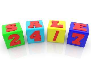 SALE 24/7 concept on colorful toy blocks on white