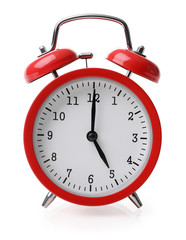 Red alarm clock set at five isolated over white background - obrazy, fototapety, plakaty