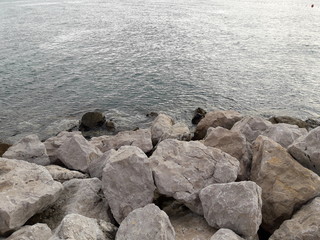 Beautiful sea waves with rocks for a wallpaper in Malinska in Croatia.