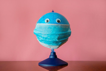 Globe in protective medical mask