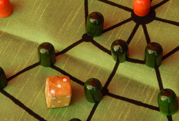 Close up of oriental or Indian or Asian dice based board game for children    
