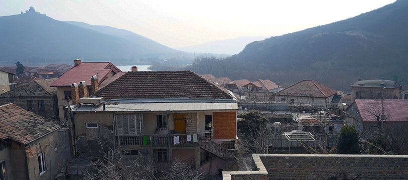 Mcheta in the morning. View on the Djvari church on the mountain. The old villadge view.