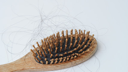 Hair loss, Solutions for hair loss,Hair loss on comb,on white background.