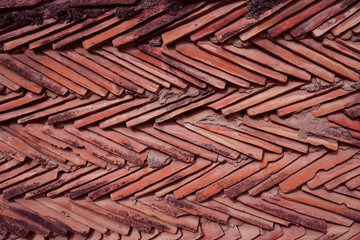 Stone and brick wall texture. Lush Lava colored bricks. Antique architectura.