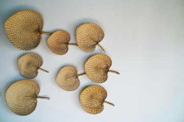 Wicker plate shape of leaves on the wall.