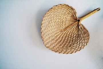 Wicker plate shape of leaves on the wall.