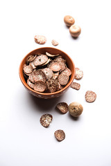 Betel nut chips in a bowl also known as slices of supari in india, used in Paan masala