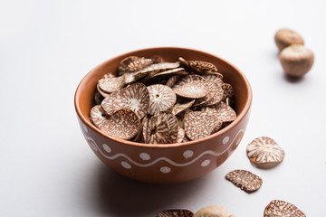 Betel nut chips in a bowl also known as slices of supari in india, used in Paan masala