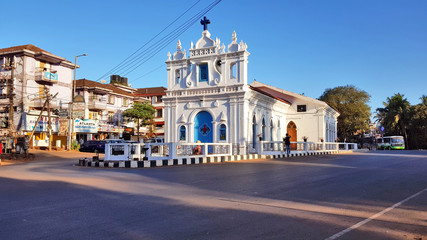 Fototapeta na wymiar St. Anthony’s Chapel is located at the center of a circle in Calangute area in Goa. Calangute beach is about one km west from this church.