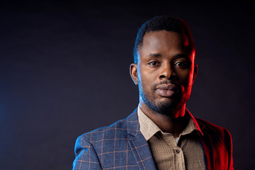 Obraz premium Cool african american man on dark background