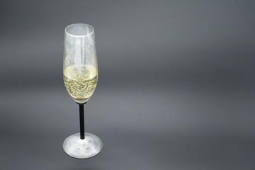 female hand with a glass of champagne