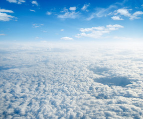 White clouds. View from the window of an airplane