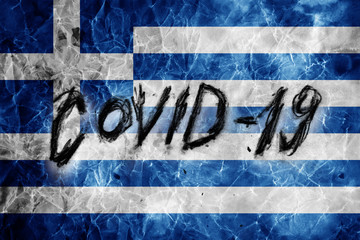 Fototapeta premium Grunge flag of Greece with hand drawn Coronavirus name on it. 2019 - 2020 Novel Coronavirus (2019-nCoV) concept, for an outbreak occurs in Greece.