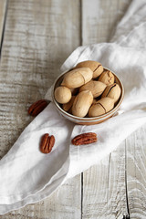 Nuts pecan on wooden table