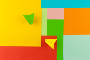 paper planes on colorful paper background, Business competition concept