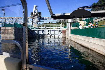 Sesto Calende (VA), Italy - September 15, 2016: A dike on Ticino River view from a boat, Lombardy, Piedmont, Italy.