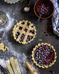 Open pie with Northern berries, cooking. The view from the top.