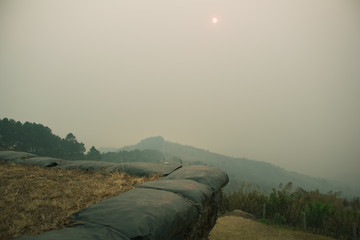 The sunset in the evening and full of haze from burning forests