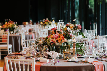 Beautiful, decorated table with flower decorations.  Wedding or party decorations.
