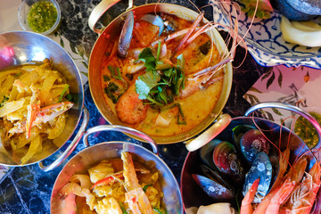 Tom Yum Kung River prawn spicy soup with many seafood boiled serve in restaurant