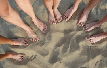 ten feet of family on the sandy beach