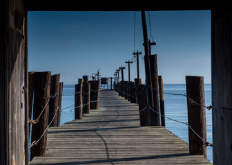 Wooden Pier of China Camp Beach, California, USA, on a blue sky, cloudless day