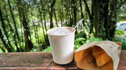 Homemade coffee and croissants In the natural forest, giving a relaxing feeling