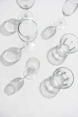 Set of wine and drinking glasses on white background