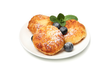 Cheese pancakes, blueberry and mint isolated on white background