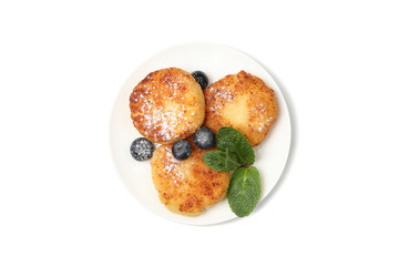 Cheese pancakes, blueberry and mint isolated on white background
