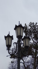 Fototapeta na wymiar street lamp in front of old building