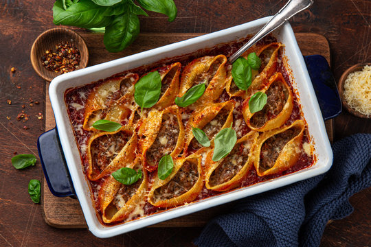 Baked Bolognese stuffed shell  pasta in baking dish