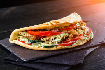 Kebab - grilled meat, bread and vegetables