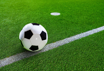 Soccer ball on the grass of a soccer field