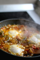 Cooking seasonal vegetables and eggs. Selective focus.