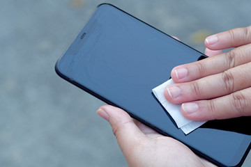 Alcohol pad for clean phone and technology to prevent corona virus covid-19 © RubenPH