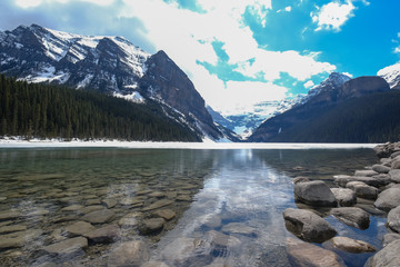 Mount fairview, partly frozen lake, Lake Louise Banff National Park, Alberta Canada