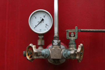 Pressure gauge on an abandoned old tank