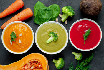 Set of vegetable soups. Broccoli, spinach, green peas soup. Pumpkin and carrot soup. Beetroot and...