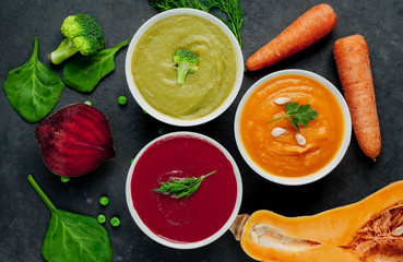 Set of vegetable soups. Broccoli, spinach, green peas soup. Pumpkin and carrot soup. Beetroot and...