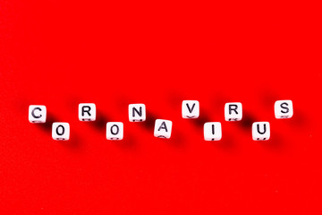 Pandemic and virus concept - Coronavirus word made of white blocks. Coronavirus text on red background.