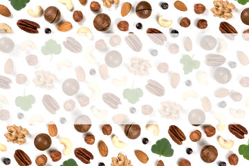 A pattern of nuts on a white background