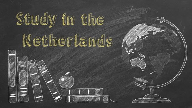 Lettering "Study in the Netherlands", rotating globe and school books are drawn with chalk on a blackboard. Study abroad concept.
